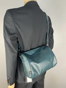 Casual dark green commuter shoulder bag for men and women, minimalist cross body bag.