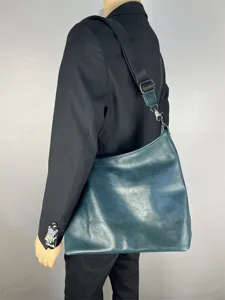Dark green leather men's shoulder bag, casual large capacity crossbody tote bag detail view.