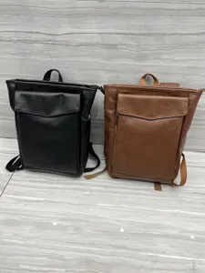 Casual PU leather backpack for men and women, stylish school bag and travel daypack in black and brown.
