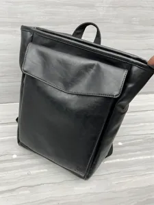 Black leather backpack for men and women, stylish daily casual school bag and travel computer pack.