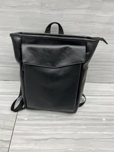 Black PU leather backpack casual school travel daypack for men and women daily use.