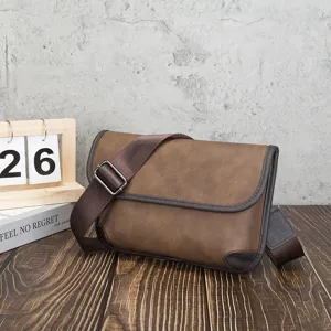 Retro brown crossbody messenger bag detail, soft leather casual shoulder bag for men.
