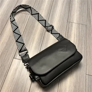 Men's black crossbody messenger bag stylish casual shoulder bag with wide geometric strap.