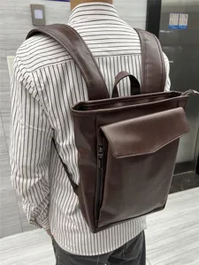 Men's retro brown PU leather backpack, stylish casual school bag for daily travel and outdoor.
