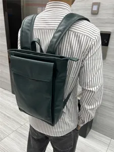 Dark green Japanese style minimalist backpack, casual student school bag for outdoor travel.