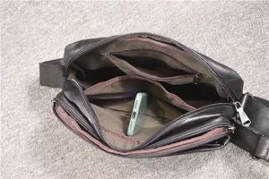 Black leather messenger bag for men women, multi-compartment casual crossbody shoulder bag.