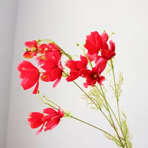 Close-up detail of artificial cosmos flower, long branch silk floral decor for home.