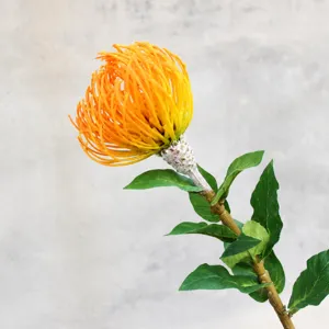 Single branch flocked pincushion flower detail shot, artificial tropical floral decor.
