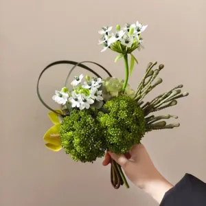 Modern mixed artificial flower bouquet for home decor, wedding props and photography staging.