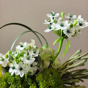 Exquisite artificial flower bouquet detail shot, perfect for home decor and photography props.