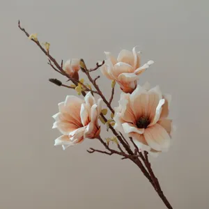 Detailed close-up of artificial magnolia flower branch, realistic EVA texture, elegant home decor.