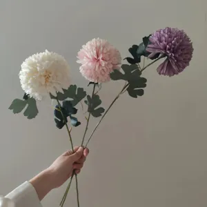 Detailed view of artificial flower branch, delicate silk decorative ball flower.