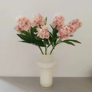 Artificial Skimmia flower branches, pink white floral arrangement in white modern vase for decor