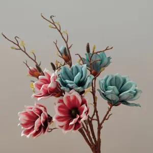 Artificial magnolia flower detail shot, EVA touch faux floral branch for home decor display.