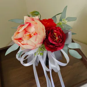 Artificial floral wedding chair back decoration with pink peony and ribbons for party detail
