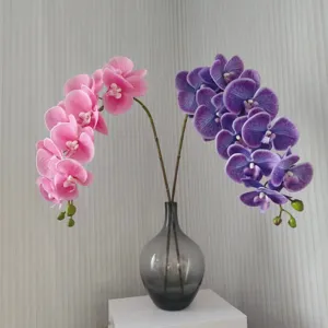 Rami di orchidee farfalla artificiali di alta qualità in vaso di vetro grigio per arredo.