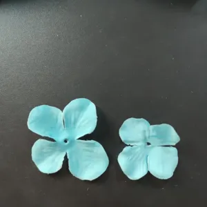 Blue artificial hydrangea flower petals detail shot for DIY craft handmade accessories.