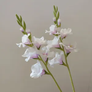 Artificial gladiolus flower stem white purple gradient home decor floral detail close up photo
