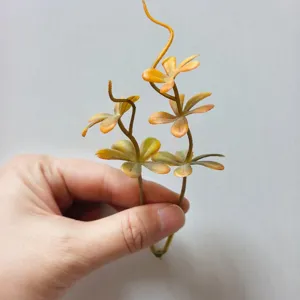 Artificial 5-petal PVC small leaves flower green plant DIY craft corsage hat accessory.