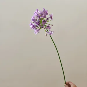 Close-up detail of the purple artificial agapanthus flower stem, perfect for floral arrangement.