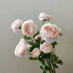 Stunning artificial pink ranunculus flower detail shot for home decor and photography prop backdrop.