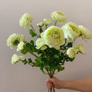 Artificial green ranunculus silk flowers bouquet for home decor and photography props.