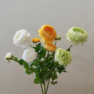 Artificial ranunculus flower detail shot, multi-color silk floral decor, macro view showcase.
