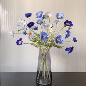 Artificial poppy flower bouquet detail view, elegant blue floral arrangement for home decor.
