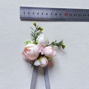 Handmade artificial pink rose boutonniere wrist flower for wedding groom groomsmen details