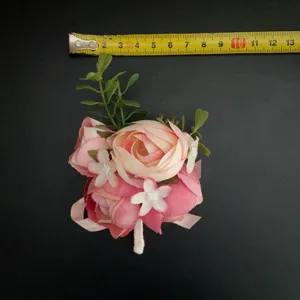 Deep pink artificial rose boutonniere for weddings, groomsmen, and party decoration props.