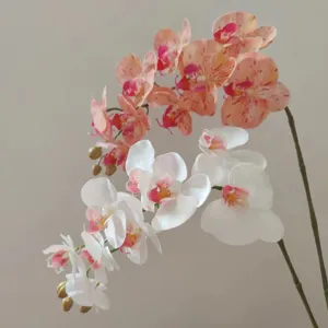 Detailed close-up shot of artificial 3D print phalaenopsis orchid flowers for home decor.