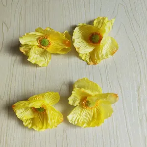 Artificial yellow poppy flower heads for DIY hair accessories, Hanfu crafts, and graduation caps.