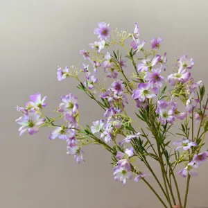 Artificial clematis silk flowers detail close-up for home decor and DIY craft arrangements.