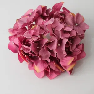 Artificial hydrangea flower head for DIY decoration background craft detail view display.