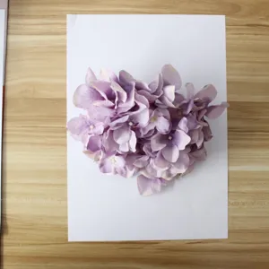 Purple artificial hydrangea flower head for DIY crafts, wedding decor and floral arrangements.