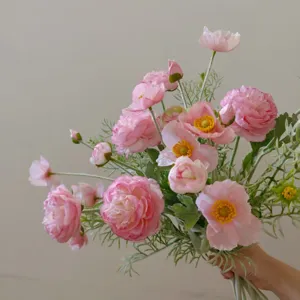 Artificial pink flower bouquet for home decor and photography prop, silk floral arrangement.