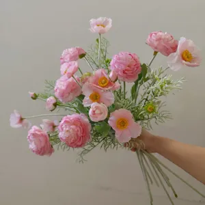 Detail shot of pink artificial silk ranunculus bouquet, floral arrangement for home decor.