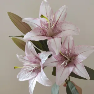 Artificial lily flower detail shot, retro pink and white silk floral material for home decor.