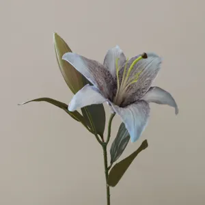 Artificial lily flower stem detail close up, vintage faux floral for home decor and photo prop.