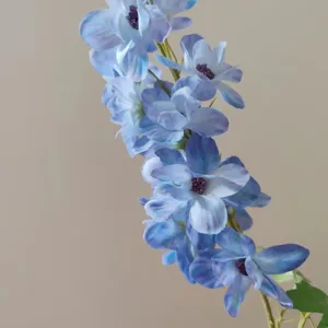 Blue artificial larkspur flower detail close-up for home decor and floral photography.