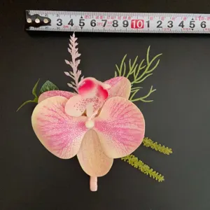 Artificial Phalaenopsis orchid boutonniere for groom wedding suit lapel flower decor.
