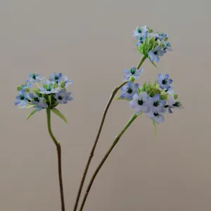 Detailed close-up of artificial blue star of bethlehem flower stem for floral arrangement.