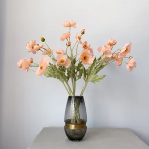 Coral pink artificial Iceland poppy silk flowers bouquet with a stylish glass vase for home decor