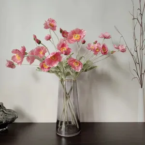 Stunning artificial Iceland poppy flowers in coral pink, perfect for home decor and styling.