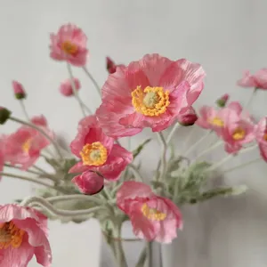 Coral pink artificial Iceland poppy flower detail, flocked stem soft home decor closeup