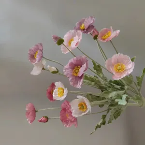 Exquisite artificial poppy flower detail, soft flocked stem, elegant home decor accent.