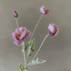 Artificial poppy flower detail close up, pink silk floral stem decor, realistic flocked texture.
