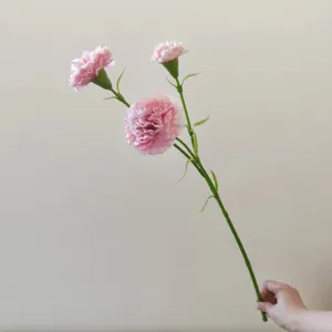 Pink artificial carnation detail shot, 3-head silk flower stem for home and event decor.