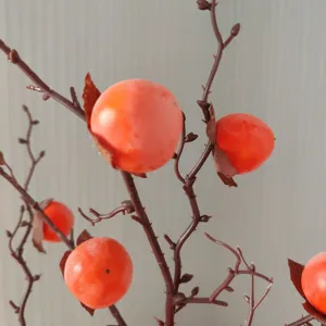 Branches d'arbres de kaki sauvages artificielles pour la decoration interieure et fond photo.