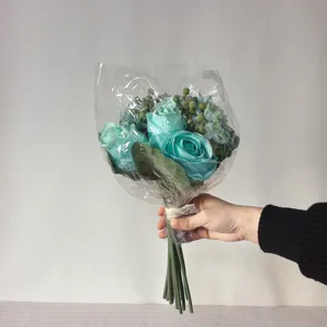 Detailed shot of artificial blue rose and hydrangea mixed bouquet for interior decoration